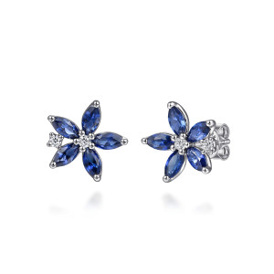 Gabriel & Co. EG15398W45SA 14 karat white gold Color earrings, front view of the pair showing the blue petal stones fanned around a small round diamond