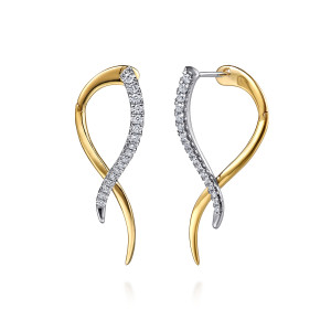 Gabriel & Co. EG15550M45JJ 14 karat white and yellow gold Kaslique earrings, front view of the pair with the diamond strand crossing the smooth tapering band