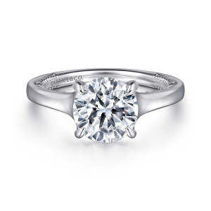 Gabriel & Co. ER11638R8W44JJ 14 karat white gold Contemporary engagement ring, front view of a smooth band widening toward a round center held by four prongs