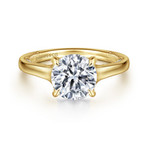 Gabriel & Co. ER11638R8Y44JJ 14 karat yellow gold Contemporary engagement ring, front view of a round center in four tapered prongs on smooth flared shoulders