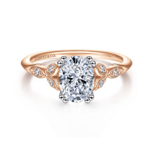 Gabriel & Co. ER11721O4T44JJ 14 karat white and rose gold Victorian engagement ring, front view of an oval center in paired prongs flanked by leaf panels with beaded edges