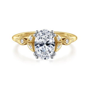 Gabriel & Co. ER11721O6M44JJ 14 karat white and yellow gold Victorian engagement ring, front view of an oval center with paired prongs and leaf frames on each shoulder