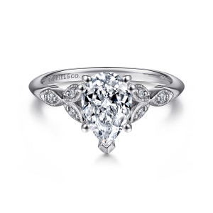Gabriel & Co. ER11721P4W44JJ 14 karat white gold Victorian engagement ring, front view of a pear shaped center with a pointed V tip and leaf frames at each side