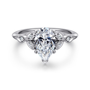 Gabriel & Co. ER11721P6W44JJ 14 karat white gold Victorian engagement ring, front view of a pear shaped center with a pointed prong at its tip between leaf panels