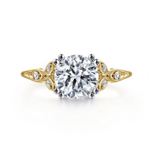 Gabriel & Co. ER11721R6M44JJ 14 karat white and yellow gold Victorian engagement ring, front view of a round center in paired ball tipped prongs between beaded leaf shoulders