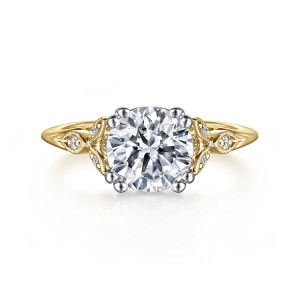 Gabriel & Co. ER11721R8M44JJ 14 karat white and yellow gold Victorian engagement ring, front view of a round center between leaf shaped shoulders with beaded edges and paired prong tips