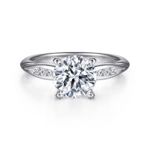 Gabriel & Co. ER11749R6W44JJ 14 karat white gold Contemporary engagement ring, front view of a round center held by four prongs between small diamond panels on both shoulders