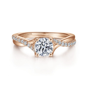 Gabriel & Co. ER11794R3K44JJ 14 karat rose gold Contemporary engagement ring, front view of a round center where the twisting band crosses at both shoulders