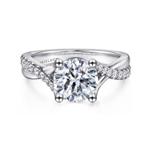 Gabriel & Co. ER11794R8W44JJ 14 karat white gold Contemporary engagement ring, front view of a round center on four ball tipped prongs above a diagonal row of stones