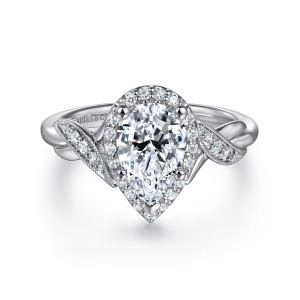 Gabriel & Co. ER11828P4W44JJ 14 karat white gold Victorian engagement ring, front view of a pear shaped center in a diamond halo with leaf shaped shoulder ribbons