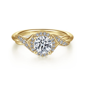 Gabriel & Co. ER11828R3Y44JJ 14 karat yellow gold Victorian engagement ring, front view of a round center in its halo with beaded ribbons twisting across both sides