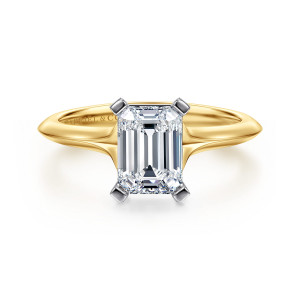 Gabriel & Co. ER11832E6M4JJJ 14 karat white and yellow gold Classic engagement ring, front view of an emerald cut center in square flat topped prongs above a ridged band