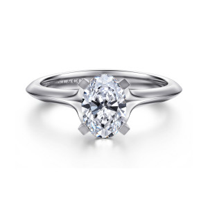 Gabriel & Co. ER11832O4W4JJJ 14 karat white gold Classic engagement ring, front view of an oval center with square flat topped prongs and edges tapering to a ridge