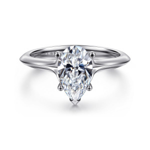 Gabriel & Co. ER11832P6W4JJJ 14 karat white gold Classic engagement ring, front view of a pear shaped center on button tipped prongs with a pointed prong at its tip