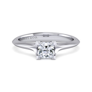 Gabriel & Co. ER11832S3W4JJJ 14 karat white gold Classic engagement ring, front view of a princess cut center held by angular corner prongs on a tapering band