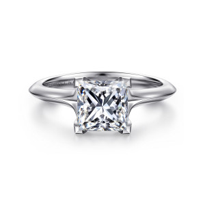 Gabriel & Co. ER11832S6W4JJJ 14 karat white gold Classic engagement ring, front view of a princess cut center in squared corner prongs with knife edge shoulders on either side