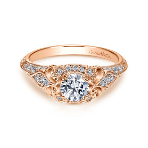 Gabriel & Co. ER11865R0K44JJ 14 karat rose gold Victorian engagement ring, front view of a round center among scrolls and beaded rims with small stones at its sides