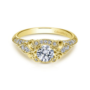 Gabriel & Co. ER11865R0Y44JJ 14 karat yellow gold Victorian engagement ring, front view of a round center framed by scrolls, beaded edges and small collar set stones