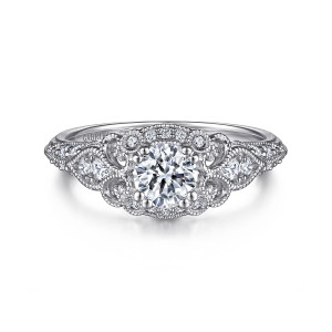 Gabriel & Co. ER11865R2W44JJ 14 karat white gold Victorian engagement ring, front view of a scalloped frame of small diamonds inside a beaded rim with scrolls at the corners