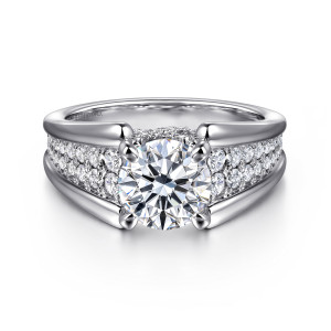 Gabriel & Co. ER12351R6W44JJ 14 karat white gold Contemporary engagement ring, front view of a round center between wide shoulders of round stones held between raised polished rails