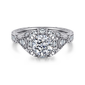 Gabriel & Co. ER12579C6W44JJ 14 karat white gold Victorian engagement ring, front view of a cushion cut center in a beaded halo with double tipped prongs at the corners