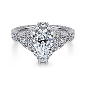 Gabriel & Co. ER12579P6W44JJ 14 karat white gold Victorian engagement ring, front view of a pear shaped center inside a halo of small stones with beaded shoulder frames