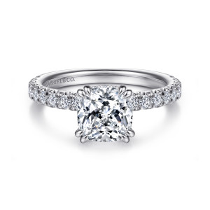 Gabriel & Co. ER13904C8W44JJ 14 karat white gold Classic engagement ring, front view of paired claw prongs at the cushion corners with diamonds down each shoulder