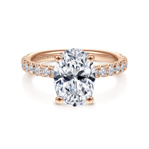 Gabriel & Co. ER13904O8K44JJ 14 karat rose gold Classic engagement ring, front view of the oval center on ball tipped prongs with diamonds along both shoulders