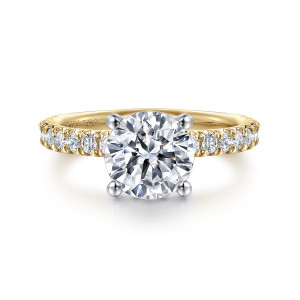 Gabriel & Co. ER13904R6M44JJ 14 karat white and yellow gold Classic engagement ring, front view of a round center held by four ball tipped claws between diamond shoulders