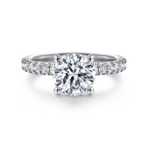 Gabriel & Co. ER13904R6W44JJ 14 karat white gold Classic engagement ring, front view of a round center in four ball tipped prongs with round diamonds along both shoulders