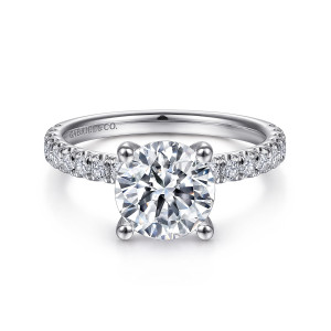 Gabriel & Co. ER13904R8PT4JJ platinum Classic engagement ring, front view of a round center on ball tipped prongs above a band of round diamonds