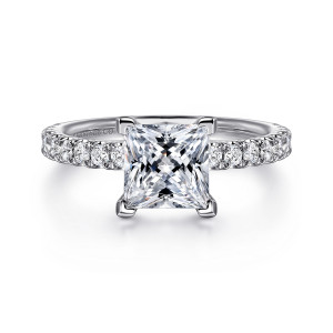 Gabriel & Co. ER13904S6W44JJ 14 karat white gold Classic engagement ring, front view of a princess cut center in squared corner prongs between rows of shoulder diamonds