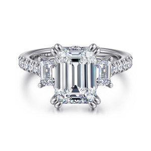 Gabriel & Co. ER14069E12W44JJ 14 karat white gold Contemporary engagement ring, front view of an emerald cut center with paired corner prongs between two step cut side stones