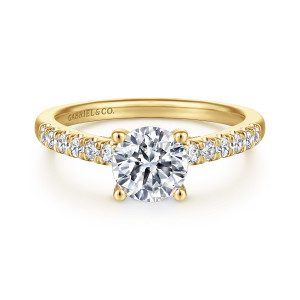 Gabriel & Co. ER14399R4Y44JJ 14 karat yellow gold Contemporary engagement ring, front view of a round center in four ball tipped prongs flanked by rows of round stones