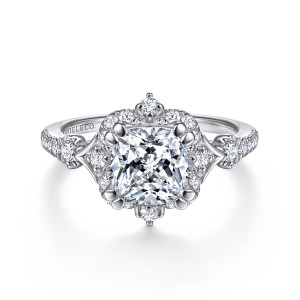 Gabriel & Co. ER14411C8W44JJ 14 karat white gold Victorian engagement ring, front view of a cushion cut center in a halo with larger stones at four points
