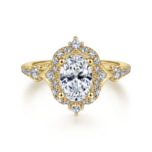 Gabriel & Co. ER14411O4Y44JJ 14 karat yellow gold Victorian engagement ring, front view of the oval center inside a diamond halo with a larger stone at each end