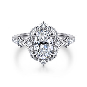 Gabriel & Co. ER14411O6W44JJ 14 karat white gold Victorian engagement ring, front view of an oval center inside a scalloped halo with a small stone at each end