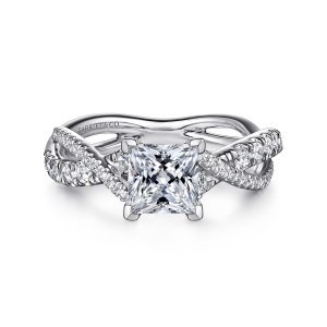 Gabriel & Co. ER14460S4W44JJ 14 karat white gold Contemporary engagement ring, front view of a princess cut center with corner prongs above crossing strands set with small stones