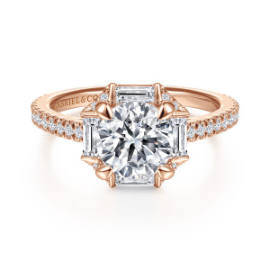Gabriel & Co. ER14526R6K44JJ 14 karat rose gold Contemporary engagement ring, front view of a round center framed by baguettes with leaf shaped prongs at the corners