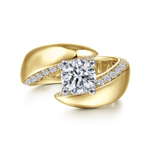 Gabriel & Co. ER14614R4M44JJ 14 karat white and yellow gold Contemporary engagement ring, front view of two wide leaf shaped shank ends sweeping past a round center