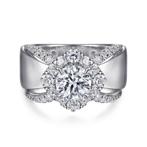 Gabriel & Co. ER14631R4W44JJ 14 karat white gold Contemporary engagement ring, front view of a round center in an angular halo with diamond strands crossing over a wide band