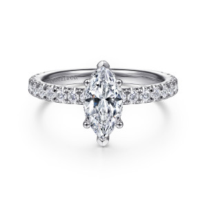 Gabriel & Co. ER14649M4W44JJ 14 karat white gold Classic engagement ring, front view of a pointed center held by tip prongs above a row of round diamonds