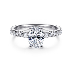 Gabriel & Co. ER14649O4W44JJ 14 karat white gold Classic engagement ring, front view of an oval center held by four ball tipped prongs above a diamond set band