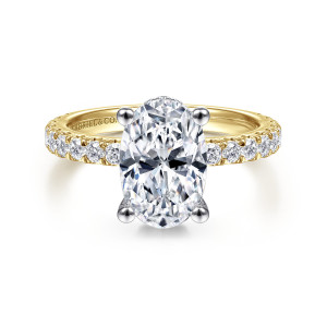 Gabriel & Co. ER14649O8M44JJ 14 karat white and yellow gold Classic engagement ring, front view of an oval center held by four rounded prongs above diamonds along the shoulders