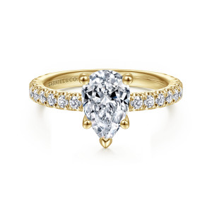 Gabriel & Co. ER14649P4Y44JJ 14 karat yellow gold Classic engagement ring, front view of a pear shaped center with a heart shaped tip prong and shoulder stones