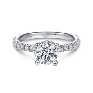 Gabriel & Co. ER14649R4PT4JJ platinum Classic engagement ring, front view of a round center on four prongs above a band of small diamonds