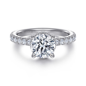 Gabriel & Co. ER14649R6W44JJ 14 karat white gold Classic engagement ring, front view of a round center in four rounded prongs with diamonds along the band