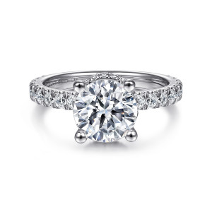 Gabriel & Co. ER14649R8W44JJ 14 karat white gold Classic engagement ring, front view of a round center in four ball tipped prongs with diamonds along the band