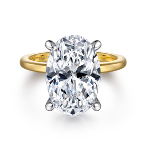 Gabriel & Co. ER14684O20M4JJJ 14 karat white and yellow gold Classic engagement ring, front view of the large oval center held by four rounded prongs above a smooth band