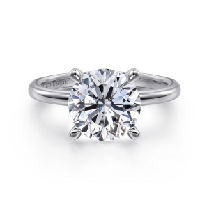 Gabriel & Co. ER14684R12W4JJJ 14 karat white gold Classic engagement ring, front view of a round center held by four tapered prongs on a smooth band